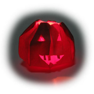 origami jack-o-lantern for Halloween with light turned off